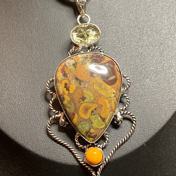 Jewelry - Rhyolite Jasper pendant with golden rutilated quartz